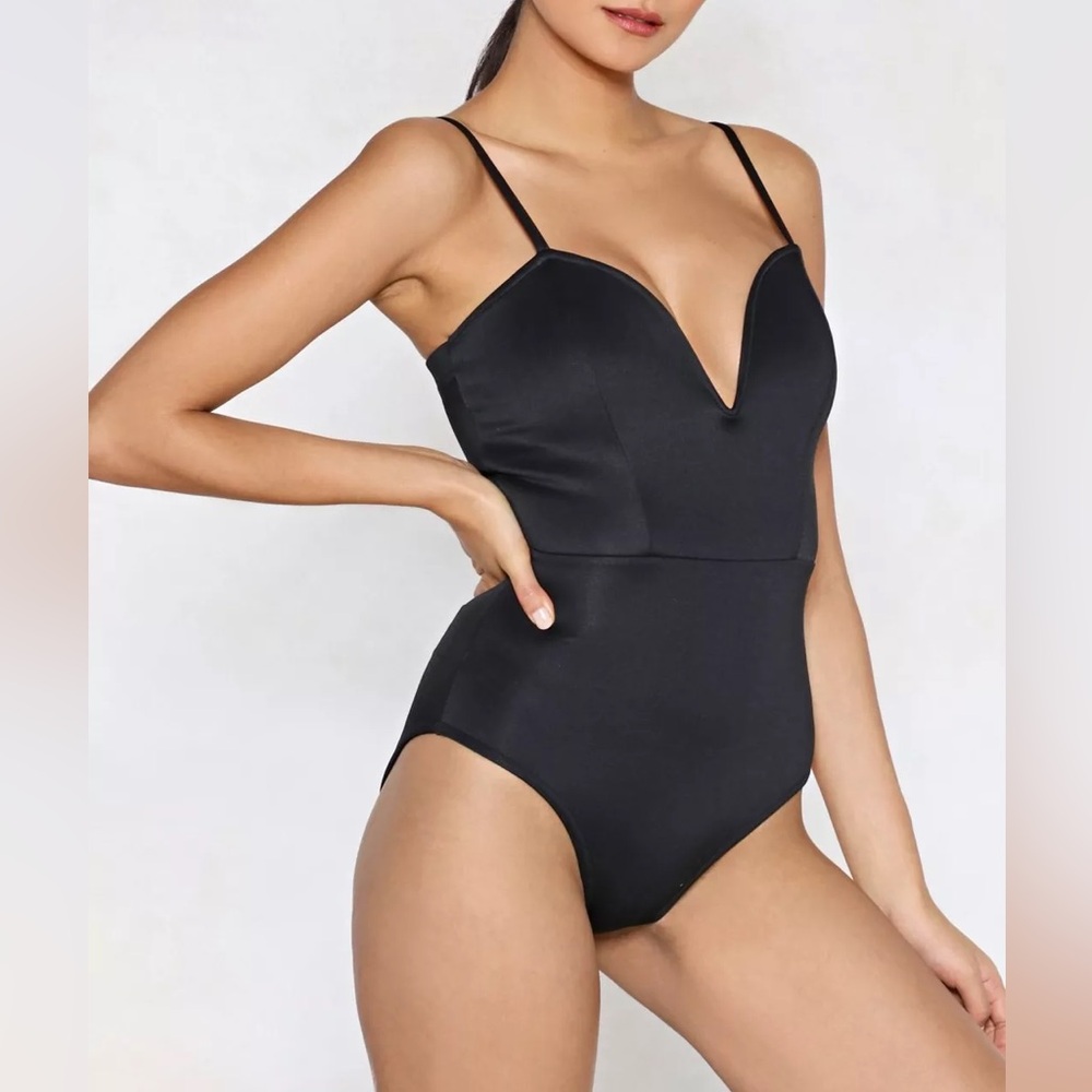 Black plunge neck bodysuit